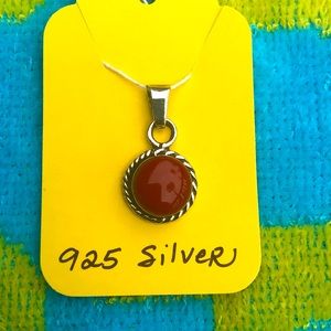 Sterling silver and red stone pendant